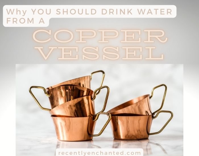 Copper cups stacked on top of each other with text overlay in copper color - why you should drink water from a copper vessel.