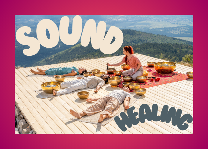 sound healer with four people getting a sound bath.