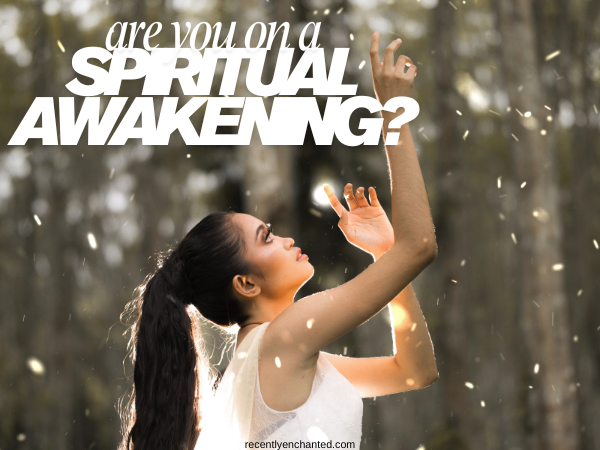 woman reaching into the sky with white orbs coming down. Text Overlay - Are you on a spiritual awkening?